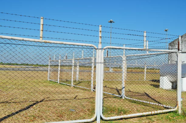 istock fence of the airport 868105830