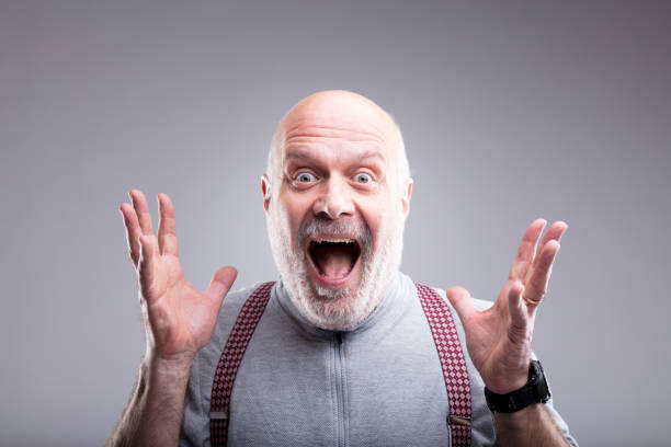 istock exaggerated surprise of an old man 868106624