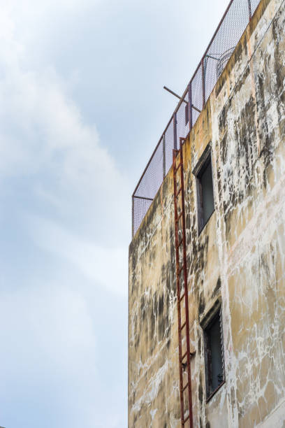 istock Staircase old vertical building metal rusted. 868112428