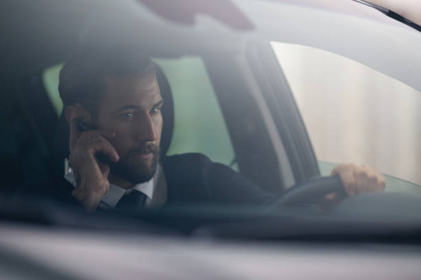 istock Businessman driving car 868120452