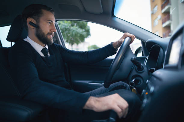 istock Businessman driving car 868121200