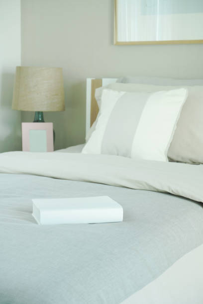 istock Close up book on bed in the bedroom 868121728