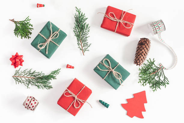 istock Christmas gifts, pine branches, toys. Flat lay, top view 868122532