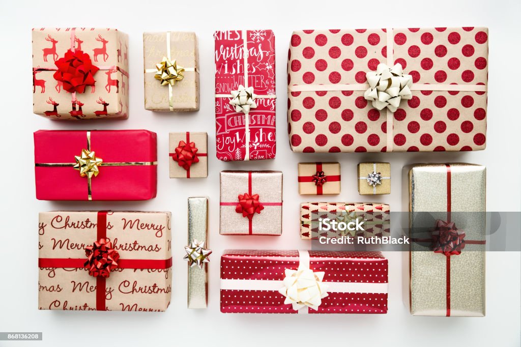 Collection of Christmas presents, overhead view Collection of Christmas presents arranged on a white background, overhead view Christmas Present Stock Photo