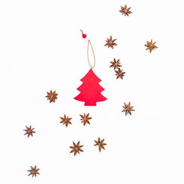istock Christmas or New Year concept with decoration and cinnamon isolated on white background. Flat lay, top view. 868136986