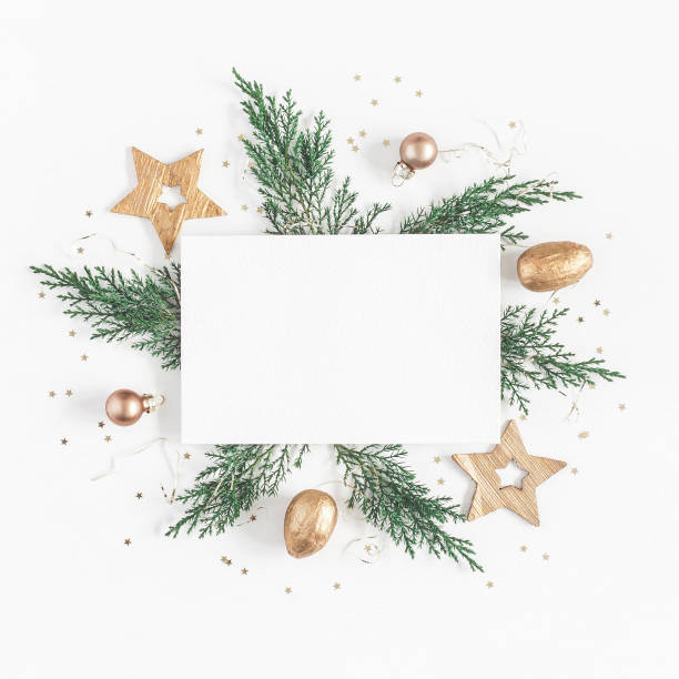paper blank, christmas tree branches, golden decorations. flat lay - christmas decoration fotos imagens e fotografias de stock