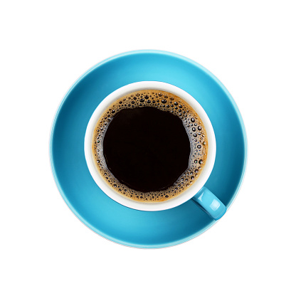 Full cup of black Americano or instant coffee on blue saucer isolated on white background, close up, elevated top view