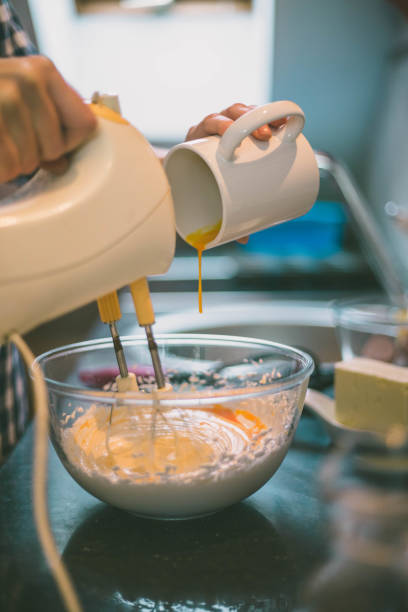 istock happy woman cooking on kitchen 868162420