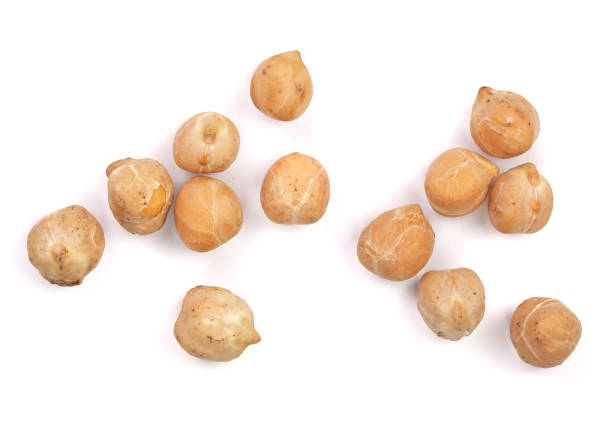 istock Dry raw organic chickpeas isolated on white background. Top view 868165310