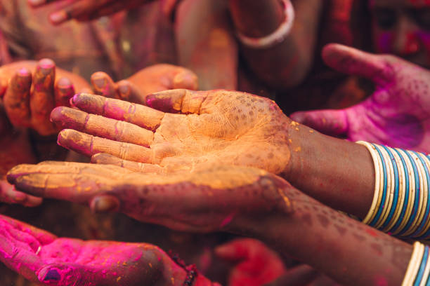 istock Holi festival hands in India 868165358