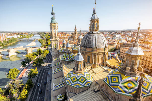 Zaragoza city in Spain Aerial cityscape view on the roofs and spires of basilica of Our Lady in Zaragoza city in Spain basilica photos stock pictures, royalty-free photos & images