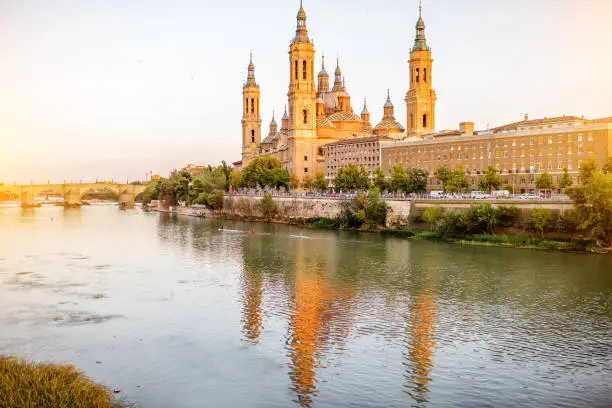 Landscape view on Elbe river with cathedral of Our Lady of the Pillar in Zaragoza city in Spain