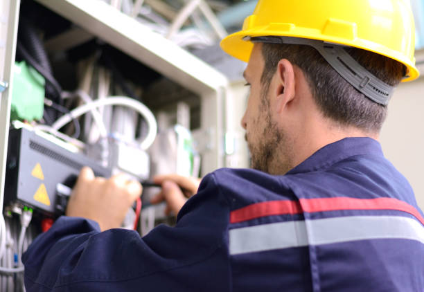 istock Electrician testing for voltage in a fuse box 868173196