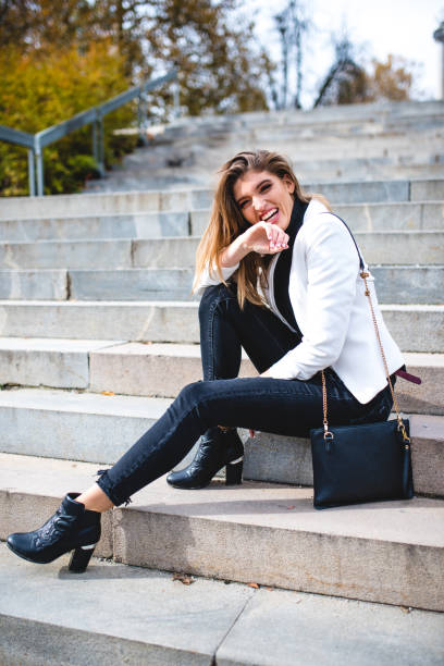 istock Beautiful woman laughing and looking at camera 868181184