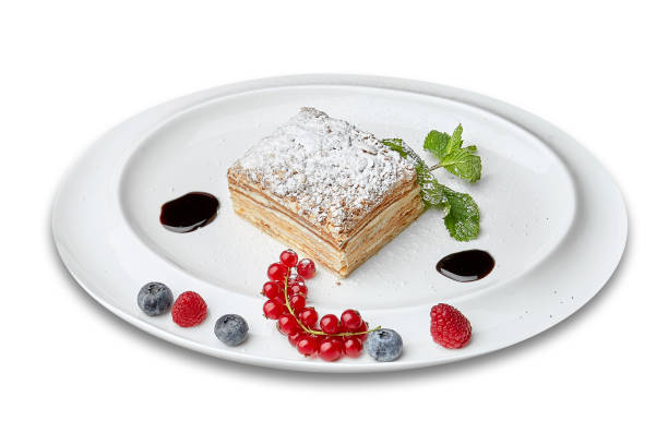 istock Napoleon cake with branch of viburnum 868183938