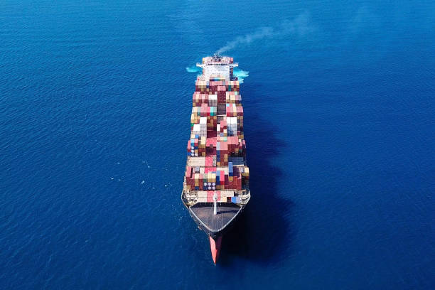 istock Large container ship at sea - Top down Aerial Image 868185092