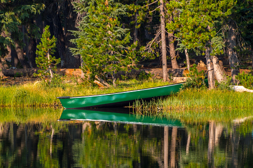 Canoe reflecting in the lake