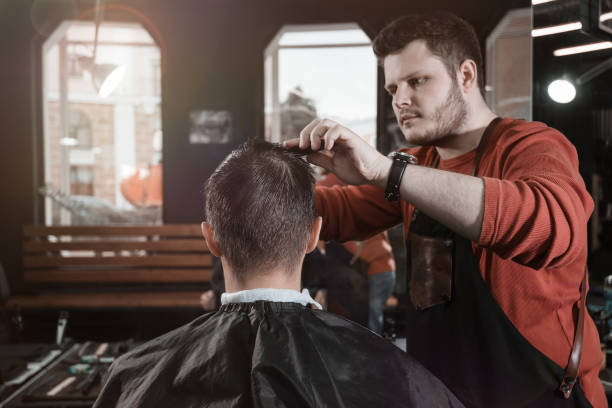 istock man in hair salon 868191874