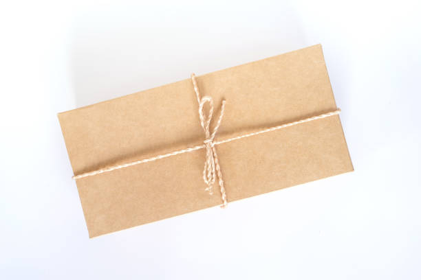 istock Top view brown gift box on isolated white background with space. 868192734