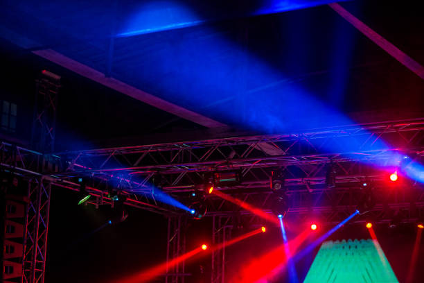 istock Stage lights on metal construction during a concert 868196090