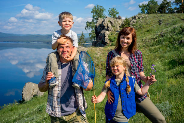 istock Happy family hiking 868199530