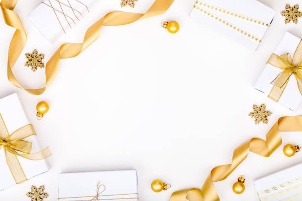 istock christmas or new year frame composition. christmas decorations in gold colors on white background with empty copy space for text. holiday and celebration concept for postcard or invitation. top view 868200624