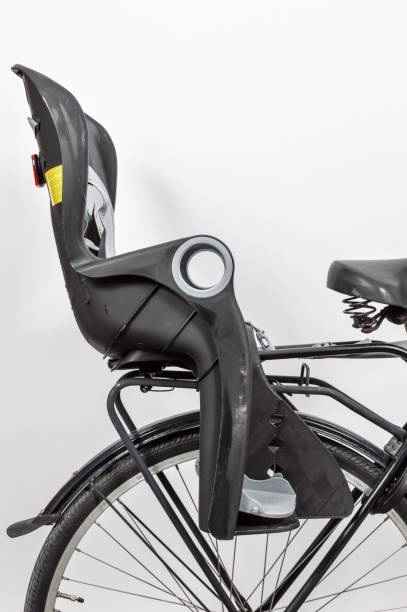 Carrying kids in a child bike seat.