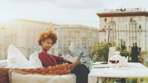 istock Mixed freelancer girl in luxury restaurant on the roof 868206962