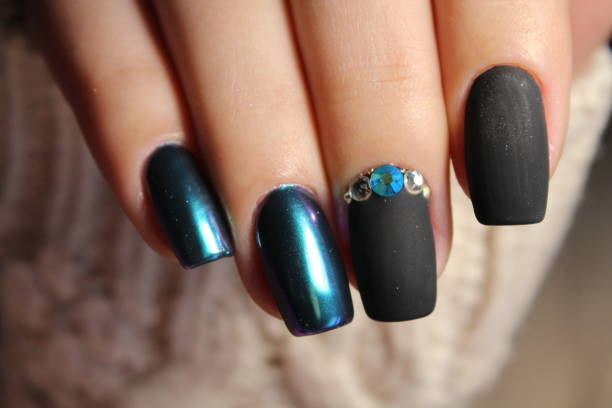 istock Manicured nails Nail Polish art design. 868216860