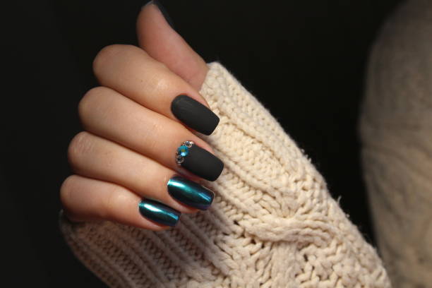 istock Women's hands with a stylish manicure. 868218170