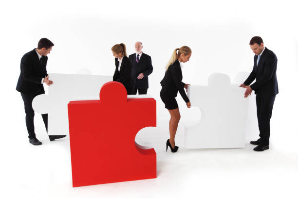 istock Business team and big puzzle 868221116