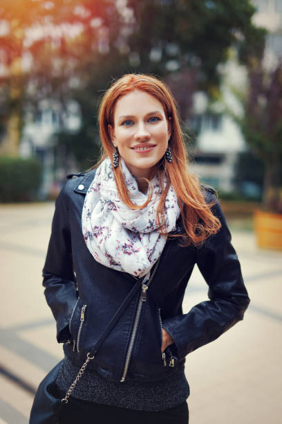 istock Trendy young redhead woman smile 868225082