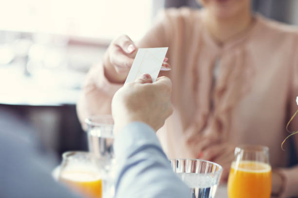 istock Two Businesspeople Meeting For Lunch In Restaurant 868227262
