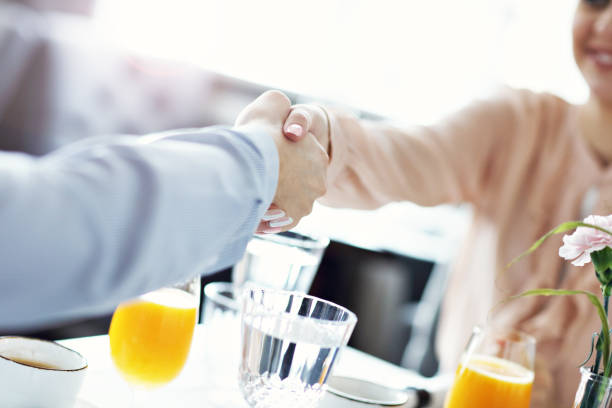 istock Two Businesspeople Meeting For Lunch In Restaurant 868227672