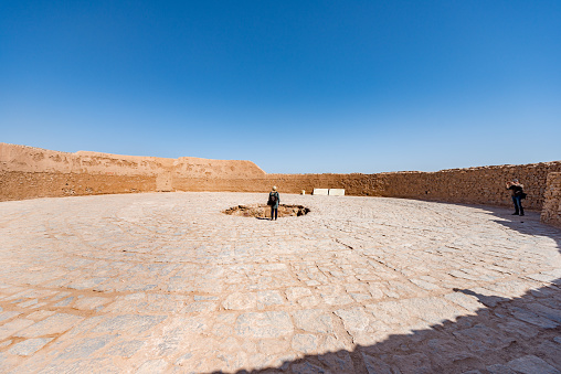 With its winding lanes, forest of badgirs, mud-brick houses and delightful places to stay, Yazd is a 'don't miss' destination. On a flat plain ringed by mountains, the city is wedged between the northern Dasht-e Kavir and southern Dasht-e Lut and is every inch a city of the desert. It may not have the big-ticket sights of Esfahan or Shiraz, but, with its atmospheric alleyways and centuries of history, it exceeds both in its capacity to enchant. Yazd warrants a lazy approach – rambling around the maze of historic lanes (referred to locally as Yazd's 'historical texture'), popping into random teahouses or pausing to work out calligraphic puzzles in the city's exquisite tilework.