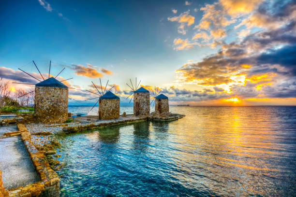 windmills of chios island, greece - greece blue house wall imagens e fotografias de stock