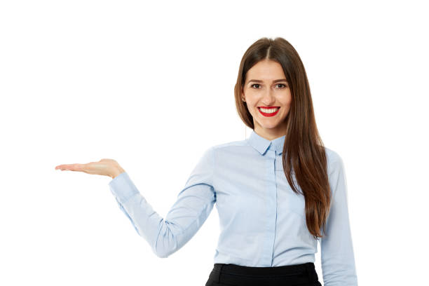 istock Attractive businesswoman presenting a product 868243482