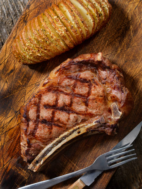 istock BBQ Prime Rib steak with a Hasselback Potato 868246048