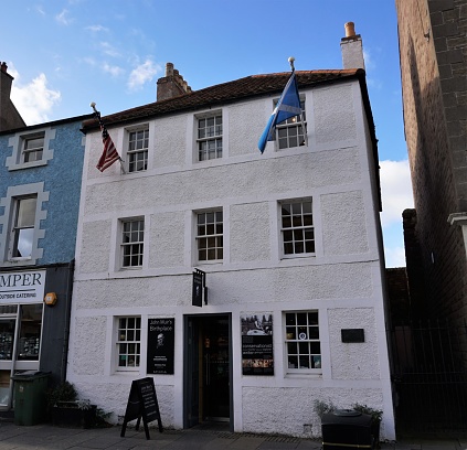 Dunbar, East Lothian, Scotland - October 25, 2017: John Muir, famous for his work in conserving wilderness areas in the USA, was born in Dunbar, Scotland. This house, on Dunbar High Street was his birthplace. It is now a museum.