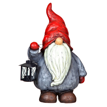 Gnome with lantern isolated on white background
