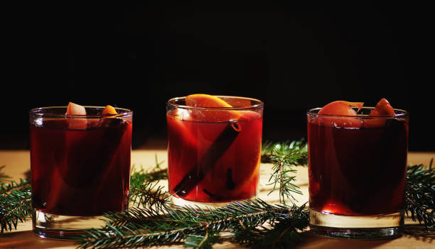 istock Hot wine drink. Warm Christmas wine. Mulled wine with oranges an 868257090