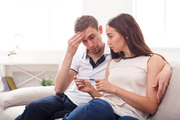 istock Sad couple after pregnancy test result copy space 868260362
