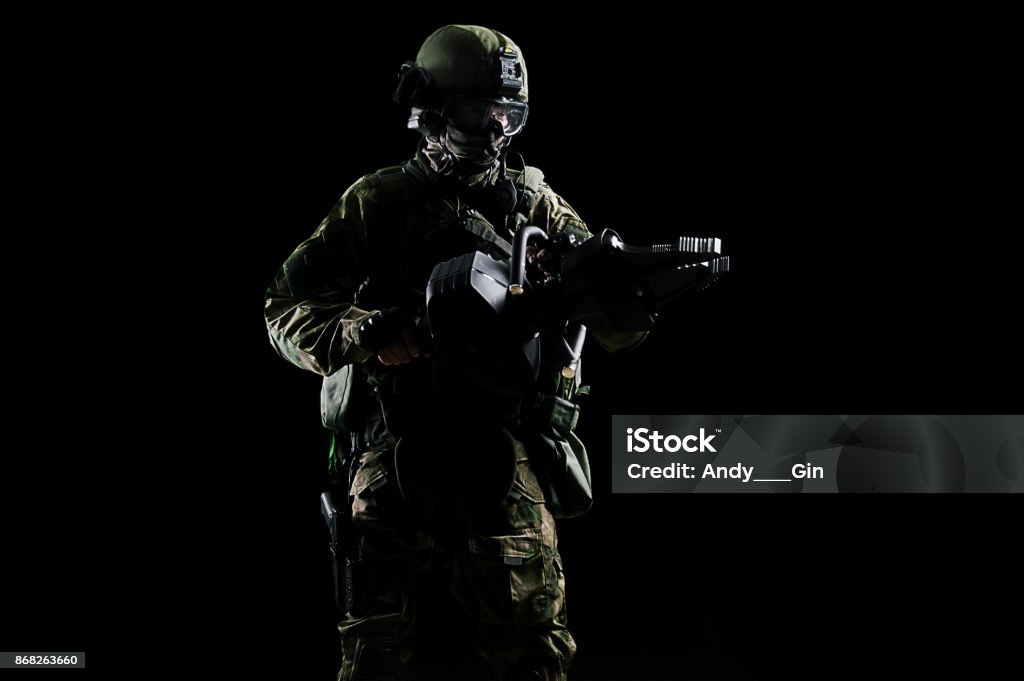 Special Group Soldier Holds A Jack To Open The Doors Stock Photo