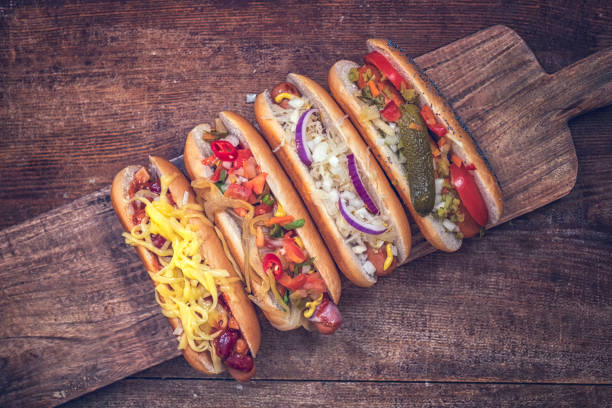 istock Hot Dog Variation on Wooden Board 868267962