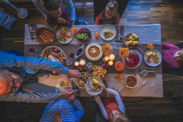 istock Family Having Traditional Holiday Stuffed Turkey Dinner 868267970