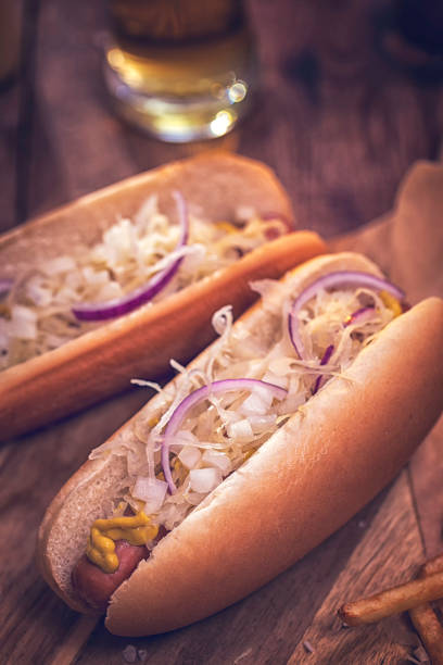 istock Hot Dog with Sauerkraut, Onions and Mustard 868268040