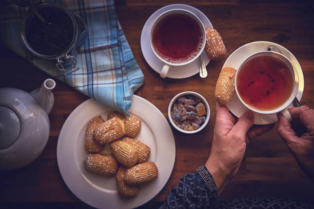 Cup of Black Tea Served with Biscuits