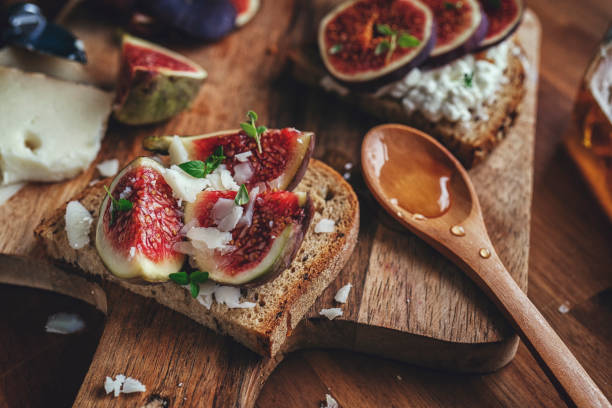 istock Brown Bread with Goat Cheese and Fresh Figs 868271276