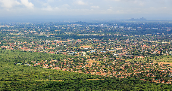 Aerial view of rapidly sprawling Gaborone city spread out over the savannah, Gaborone, Botswana, Africa, 2017
