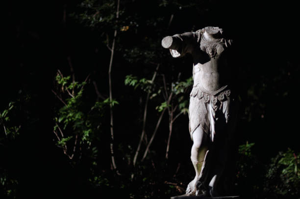 Ancient stone lion statue and crescent. On night sky background with stars and clouds